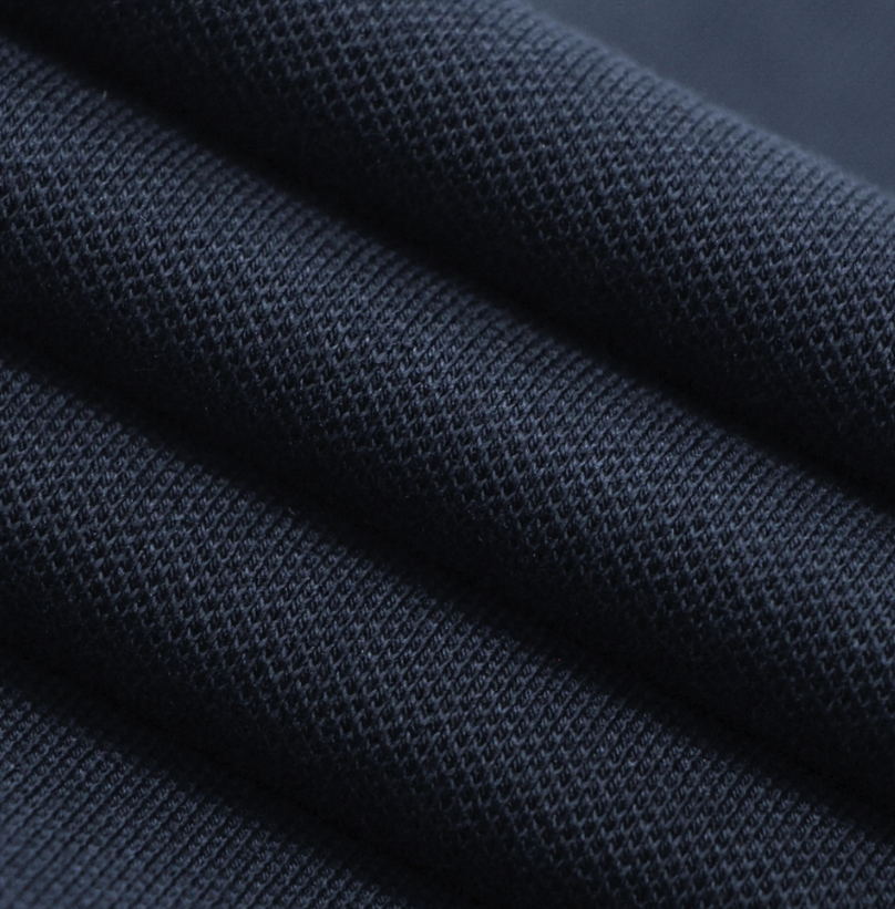 قميص بولو قطني/ليكرا بيكيه بياقة محبوكة وأكمام قصيرة وقصة ضيقة بلون موحد