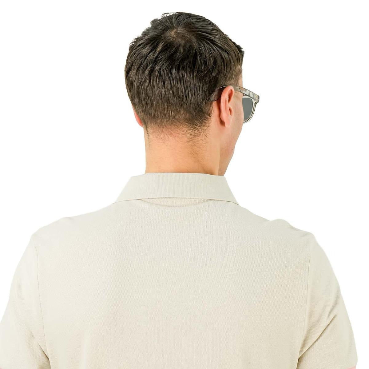 قميص بولو قطني بيكيه بياقة محبوكة مسطحة وأكمام قصيرة وقصة ضيقة مطرزة بلون سادة