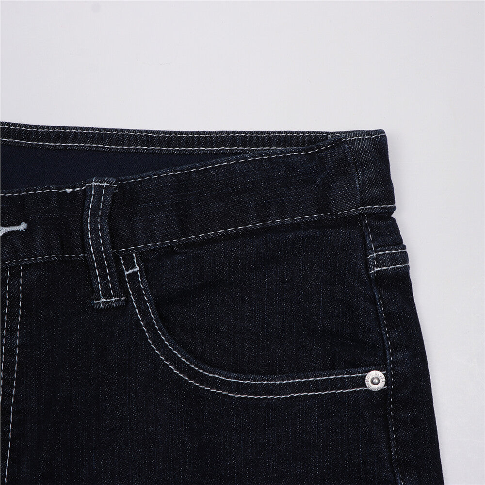 بنطلون جينز ضيق بقصة مدببة من القطن/السباندكس