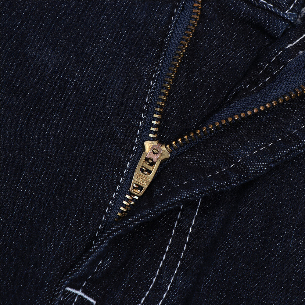 بنطلون جينز ضيق بقصة مدببة من القطن/السباندكس