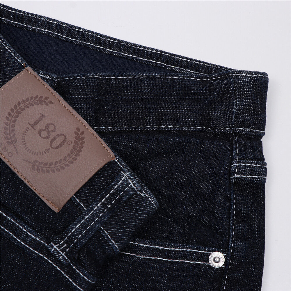 بنطلون جينز ضيق بقصة مدببة من القطن/السباندكس