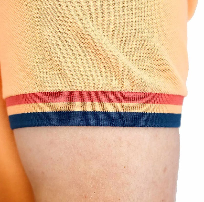 قميص بولو قطني بيكيه بياقة محبوكة مسطحة وأكمام قصيرة مطرزة بلون موحد (قميص بولو رياضي)