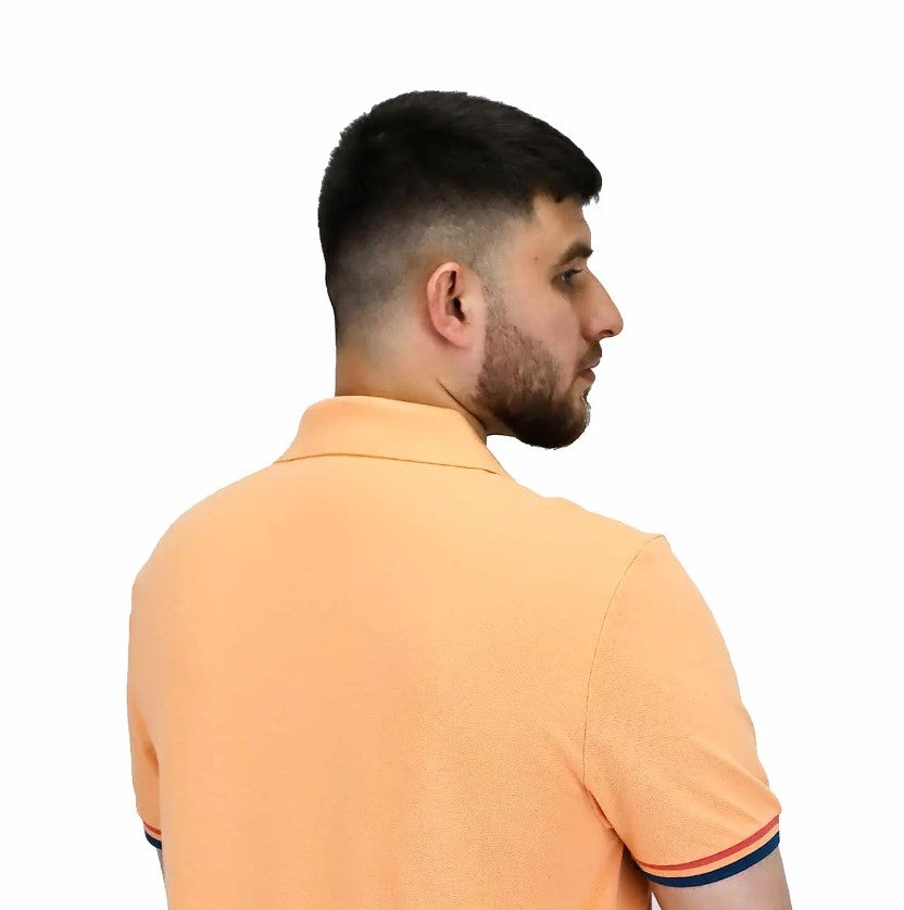 قميص بولو قطني بيكيه بياقة محبوكة مسطحة وأكمام قصيرة مطرزة بلون موحد (قميص بولو رياضي)