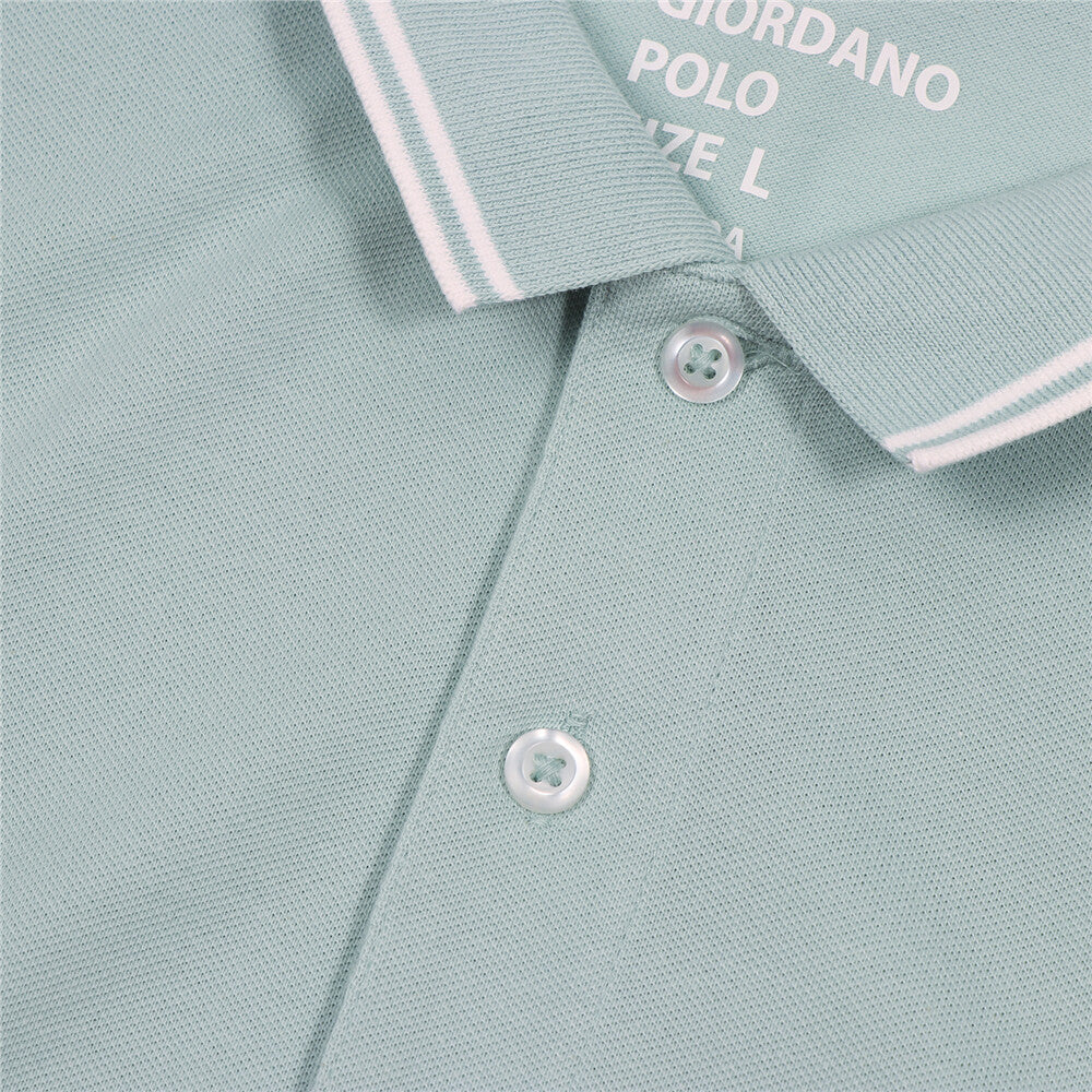 قميص بولو قطني/ليكرا بيكيه بياقة محبوكة وأكمام قصيرة وقصة ضيقة بلون موحد