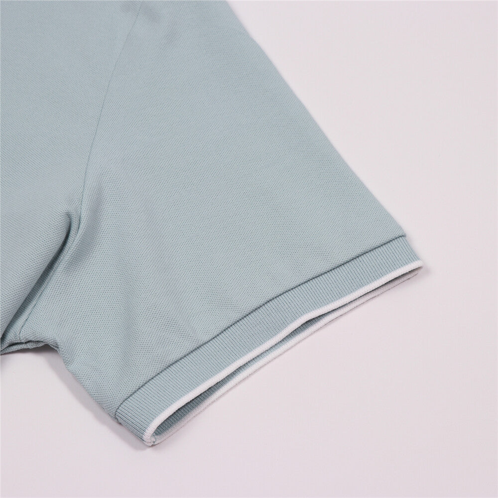 قميص بولو قطني/ليكرا بيكيه بياقة محبوكة وأكمام قصيرة وقصة ضيقة بلون موحد