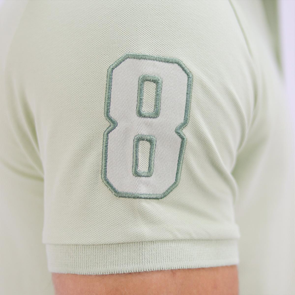 قميص بولو قصير الأكمام بتطريز جريء، مصنوع من القطن/ليكرا بيكيه، بياقة محبوكة