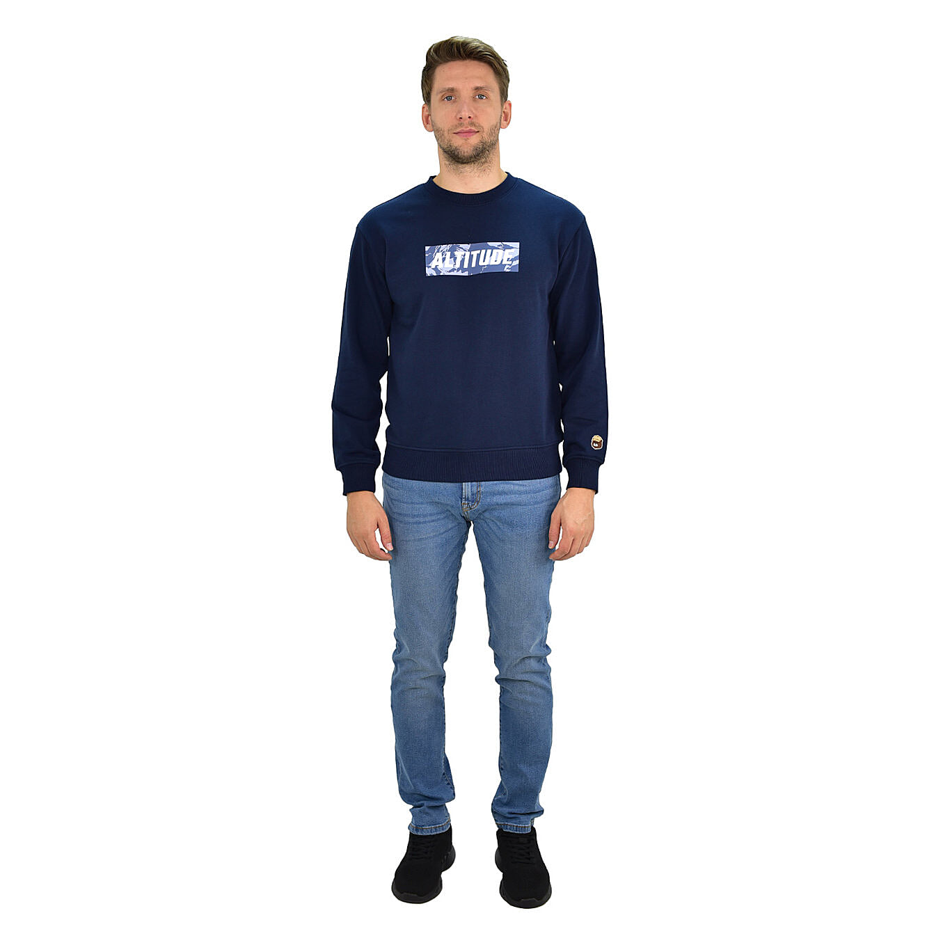 بنطلون جينز ضيق بقصة مدببة من القطن/السباندكس