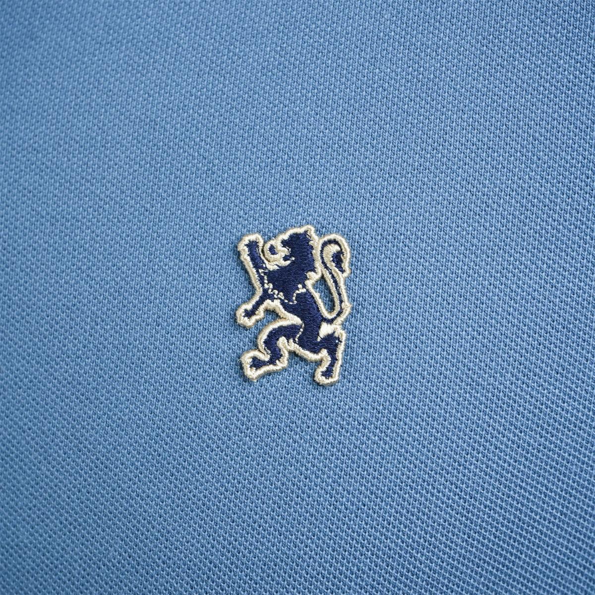 قميص بولو قطني بيكيه بياقة محبوكة مسطحة وأكمام قصيرة مطرزة بلون موحد (قميص بولو رياضي)