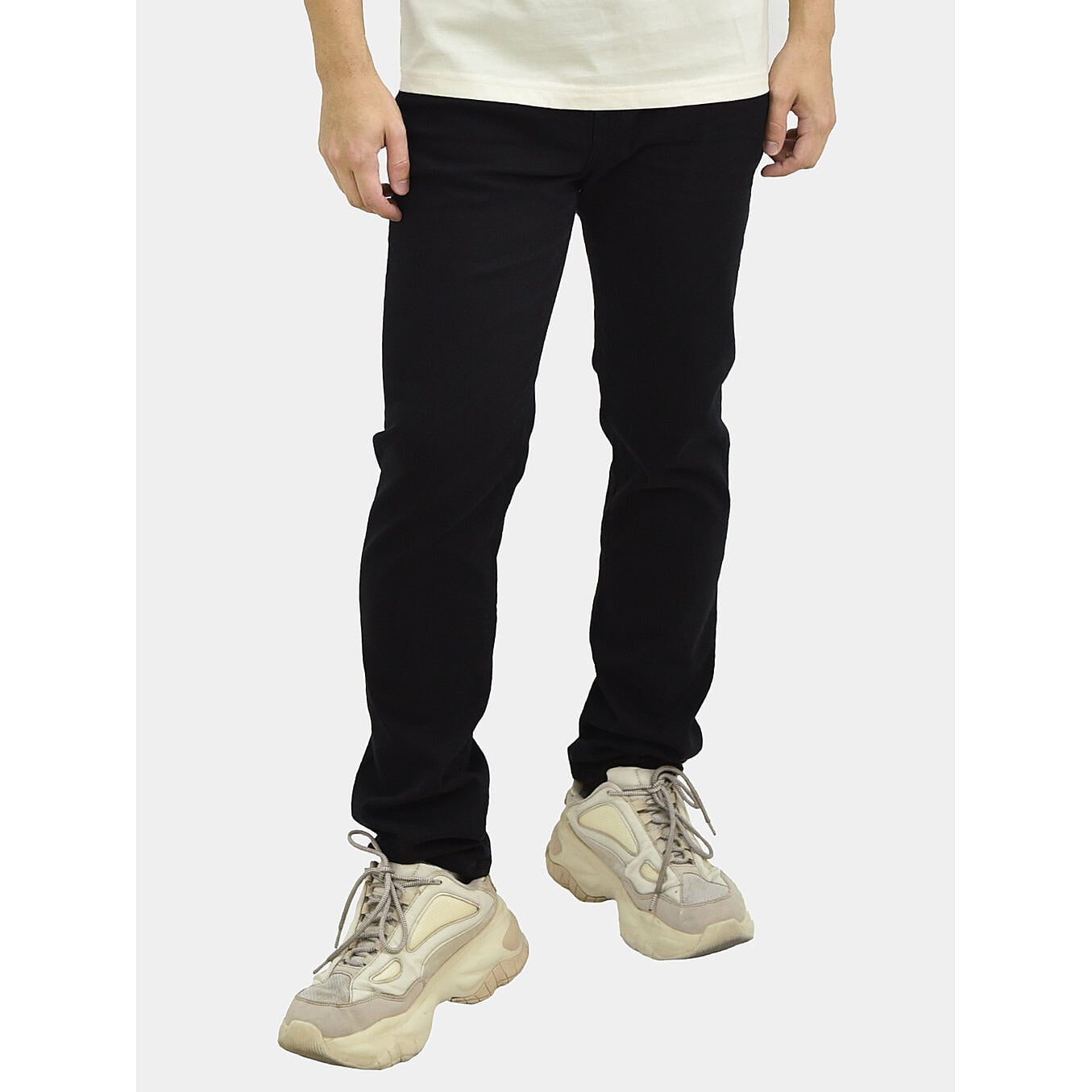 بنطلون جينز ضيق بقصة مدببة من القطن/السباندكس