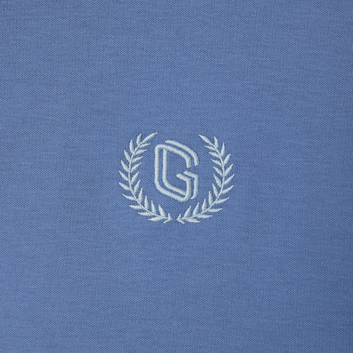 قميص بولو قطني محبوك مسطح بياقة وأكمام قصيرة وتطريز ضيق بلون سادة (ملمس سائل)