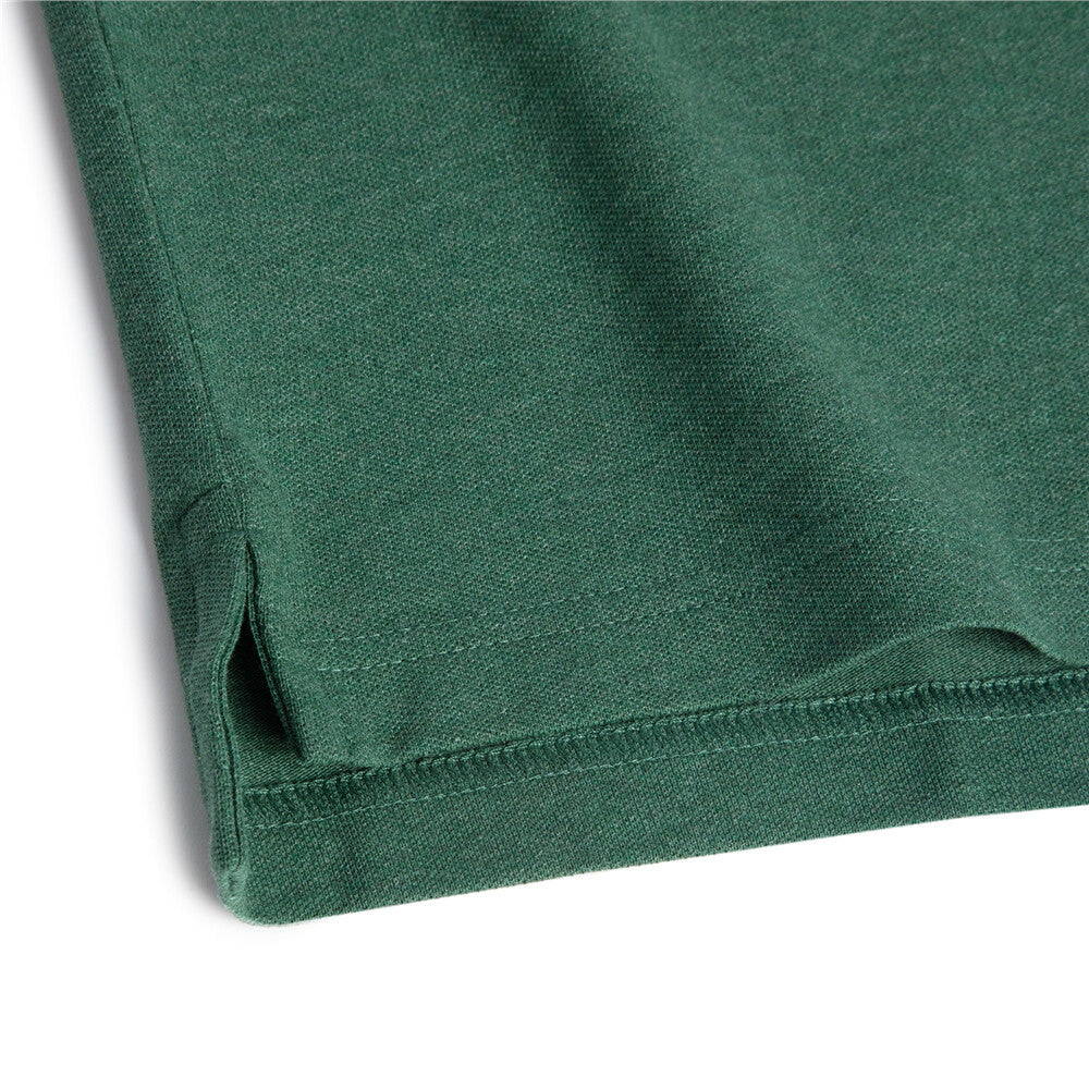 قميص بولو قطني/ليكرا بيكيه بياقة محبوكة وأكمام قصيرة وقصة ضيقة بلون موحد