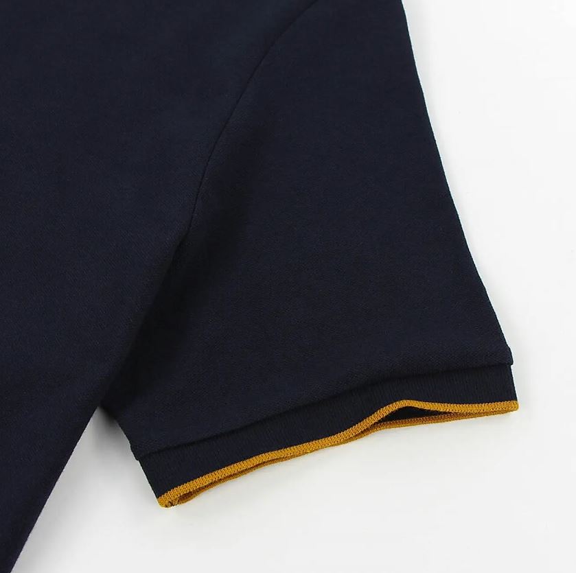 قميص بولو قطني/ليكرا بيكيه بياقة محبوكة وأكمام قصيرة وقصة ضيقة بلون موحد